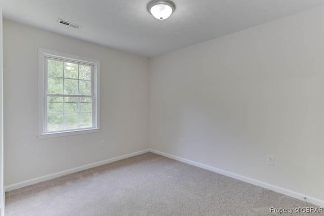 1928 Box St, Hampton, VA 23661 - empty room featuring light colored carpet and baseboards