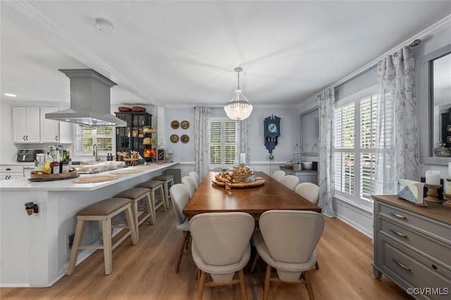 905 Manakin Rd, Midlothian, VA 23113 - dining space with healthy amount of natural light, light wood-style flooring, and ornamental molding