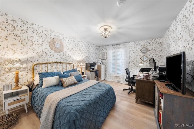 905 Manakin Rd, Midlothian, VA 23113 - bedroom with wallpapered walls, an office area, and light wood finished floors
