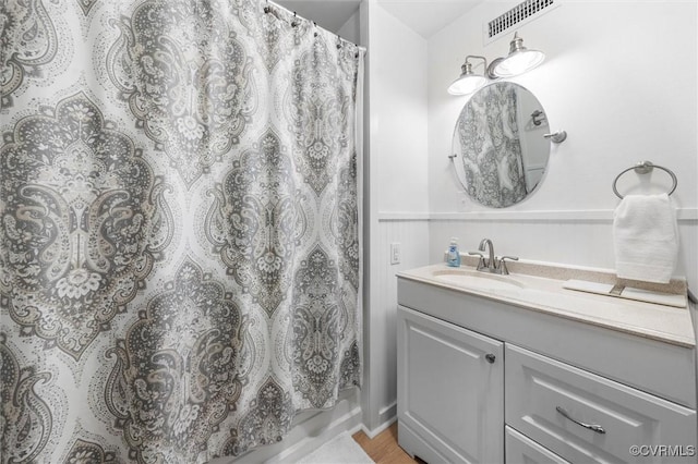 905 Manakin Rd, Midlothian, VA 23113 - full bath with vanity, wood finished floors, and curtained shower