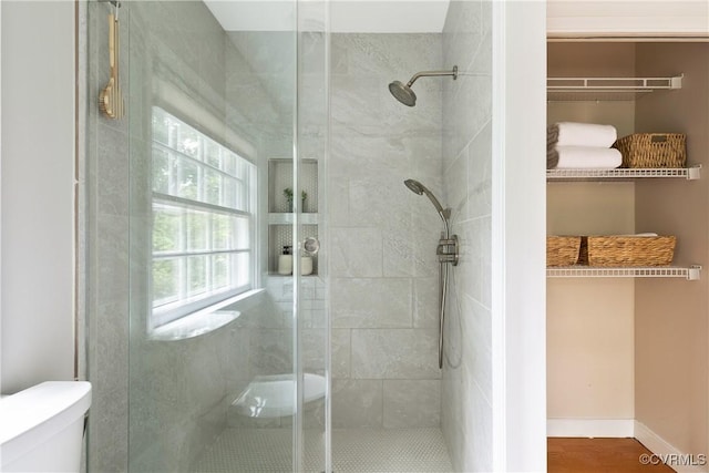 7625 Marilea Rd, Richmond, VA 23225 - full bathroom featuring a shower stall, toilet, and baseboards