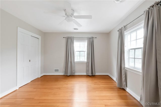 7625 Marilea Rd, Richmond, VA 23225 - unfurnished bedroom with light wood-style floors, baseboards, a closet, and ceiling fan