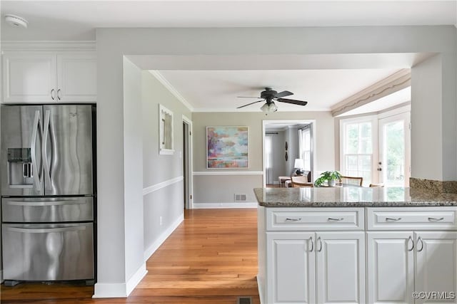 7625 Marilea Rd, Richmond, VA 23225 - kitchen with stainless steel fridge with ice dispenser, white cabinetry, light wood finished floors, crown molding, and a ceiling fan