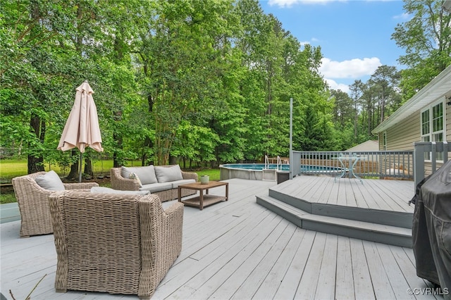160 Woodland Trl, West Point, VA 23181 - wooden deck with outdoor lounge area, an outdoor pool, and view of scattered trees