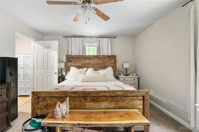 160 Woodland Trl, West Point, VA 23181 - carpeted bedroom with baseboards and ceiling fan