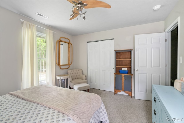 160 Woodland Trl, West Point, VA 23181 - bedroom with light carpet, a closet, and ceiling fan
