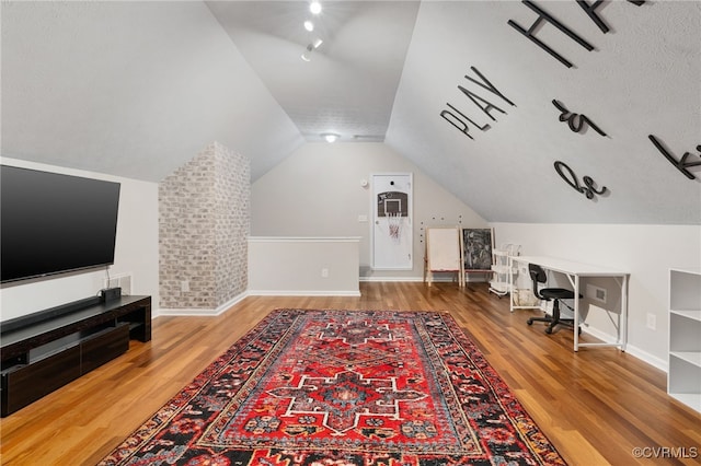 160 Woodland Trl, West Point, VA 23181 - office area featuring wood finished floors, vaulted ceiling, and baseboards