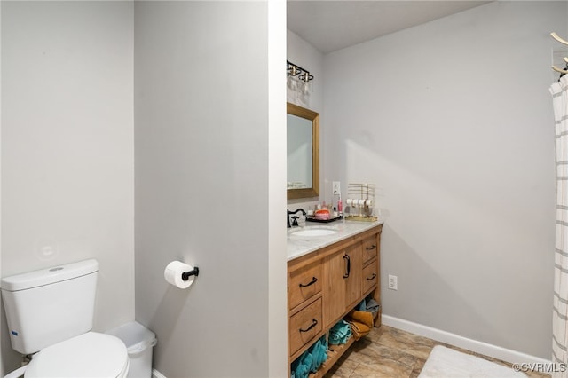 160 Woodland Trl, West Point, VA 23181 - bathroom featuring vanity, toilet, and baseboards
