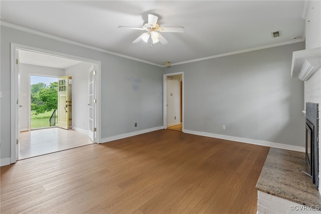 11440 Bienvenue Rd, Rockville, VA 23146 - unfurnished living room with ornamental molding, a ceiling fan, wood finished floors, baseboards, and a fireplace