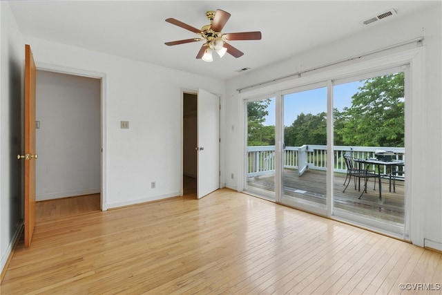 11440 Bienvenue Rd, Rockville, VA 23146 - spare room featuring light wood-style floors, ceiling fan, and baseboards