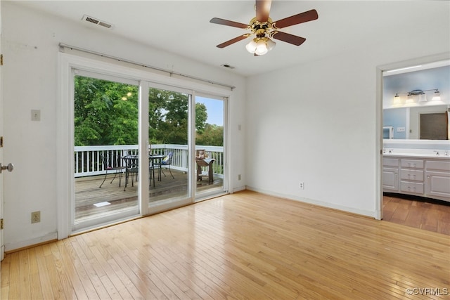 11440 Bienvenue Rd, Rockville, VA 23146 - empty room with light wood-style floors, ceiling fan, and baseboards