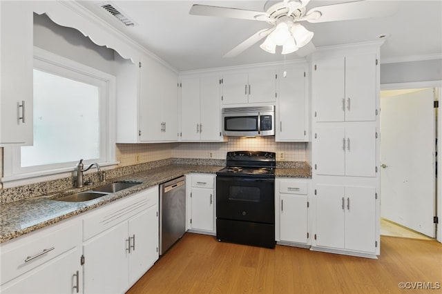 11440 Bienvenue Rd, Rockville, VA 23146 - kitchen featuring stainless steel appliances, a sink, light wood finished floors, ceiling fan, and white cabinets