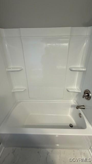 9014 Weldon Dr, Henrico, VA 23229 - bathroom featuring marble look tiles and shower / bathtub combination