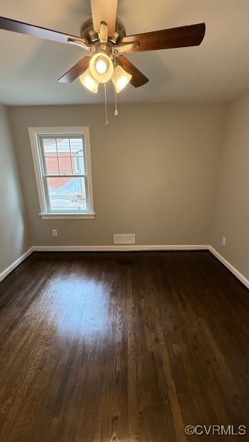 9014 Weldon Dr, Henrico, VA 23229 - spare room featuring dark wood finished floors, baseboards, and a ceiling fan