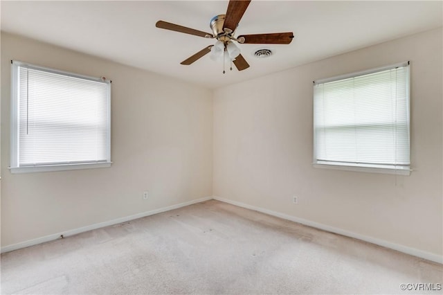 3307 Carlisle Ave, Hopewell, VA 23860 - carpeted spare room with baseboards and a ceiling fan