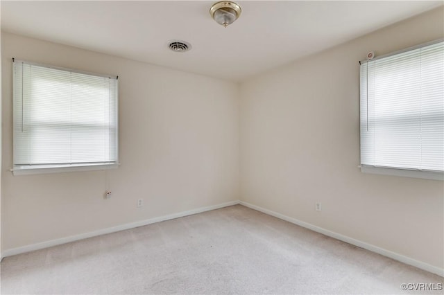 3307 Carlisle Ave, Hopewell, VA 23860 - empty room featuring carpet, healthy amount of natural light, and baseboards