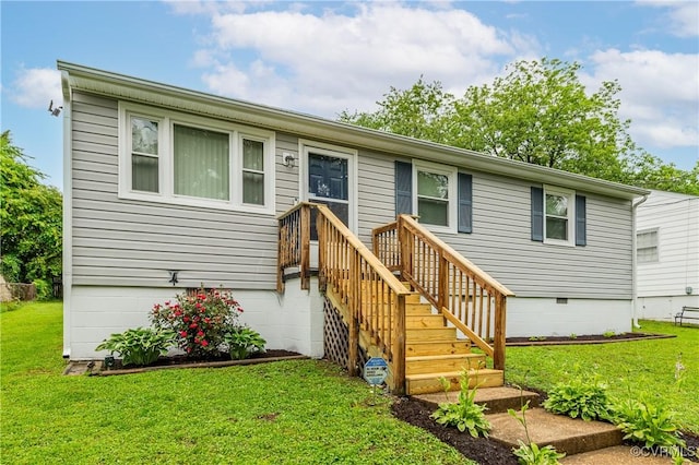 3307 Carlisle Ave, Hopewell, VA 23860 - view of front facade featuring crawl space and a front yard