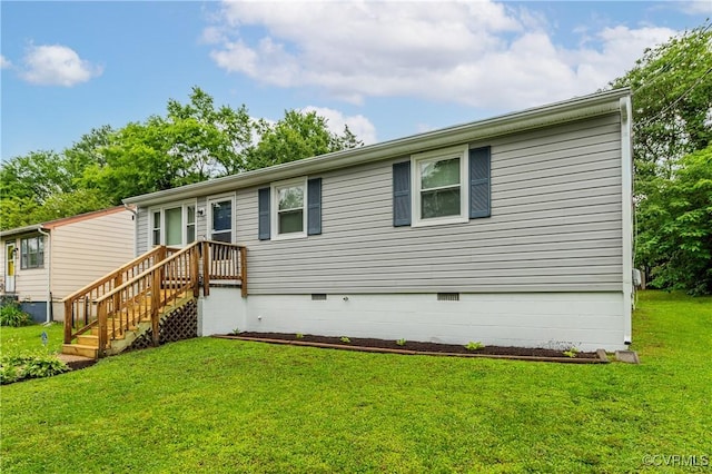 3307 Carlisle Ave, Hopewell, VA 23860 - rear view of property with crawl space and a yard