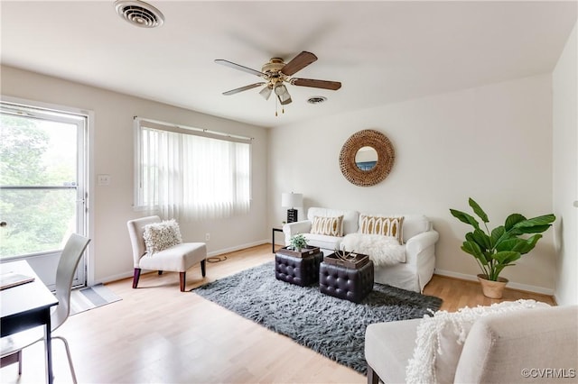 3307 Carlisle Ave, Hopewell, VA 23860 - living room with healthy amount of natural light, ceiling fan, and light wood-type flooring
