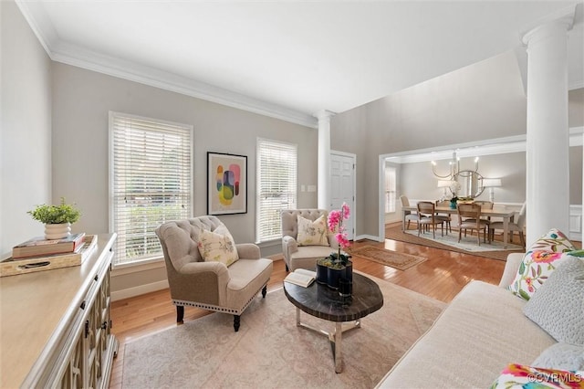 13212 Railey Hill Dr, Midlothian, VA 23114 - living area with decorative columns, light wood-type flooring, and crown molding