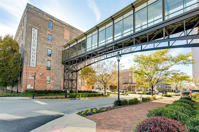 251 Rocketts Way Unit 210, Henrico, VA 23231 - view of road featuring sidewalks, street lighting, and curbs