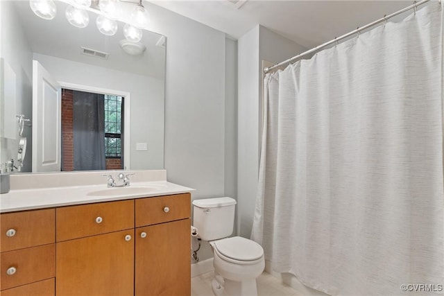 251 Rocketts Way Unit 210, Henrico, VA 23231 - full bathroom featuring toilet, vanity, tile patterned floors, and a shower with shower curtain