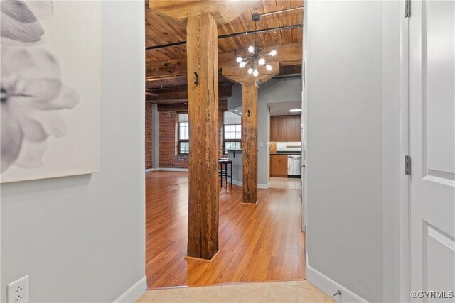251 Rocketts Way Unit 210, Henrico, VA 23231 - hall featuring wooden ceiling with exposed beams, decorative columns, baseboards, and light tile patterned floors