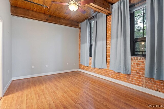 251 Rocketts Way Unit 210, Henrico, VA 23231 - spare room featuring wood ceiling with exposed beams, wood finished floors, baseboards, a ceiling fan, and brick wall