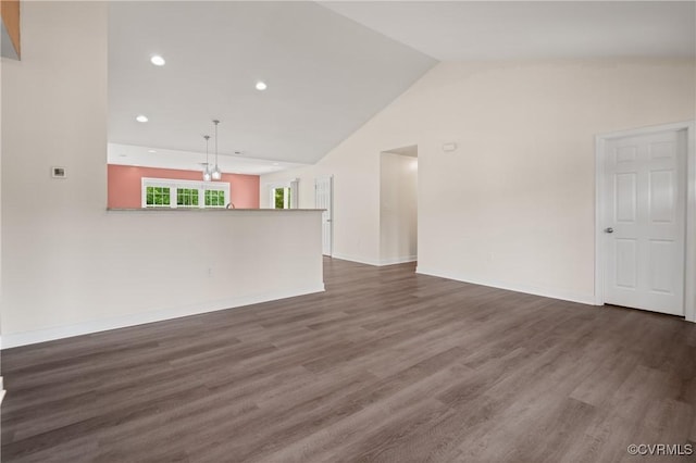 15631 Corte Castle Ter, Chesterfield, VA 23838 - unfurnished living room featuring vaulted ceiling, dark wood-style floors, recessed lighting, and baseboards