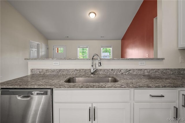 15631 Corte Castle Ter, Chesterfield, VA 23838 - kitchen featuring stainless steel dishwasher, a sink, vaulted ceiling, white cabinetry, and dark stone counters