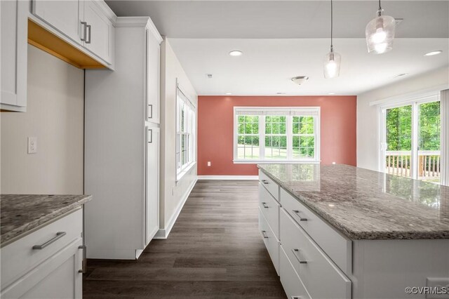 15631 Corte Castle Ter, Chesterfield, VA 23838 - kitchen featuring dark wood-style floors, recessed lighting, plenty of natural light, white cabinets, and a center island
