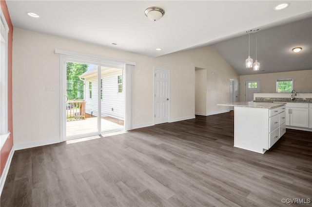 15631 Corte Castle Ter, Chesterfield, VA 23838 - kitchen with dark wood-type flooring, plenty of natural light, decorative light fixtures, white cabinetry, and vaulted ceiling