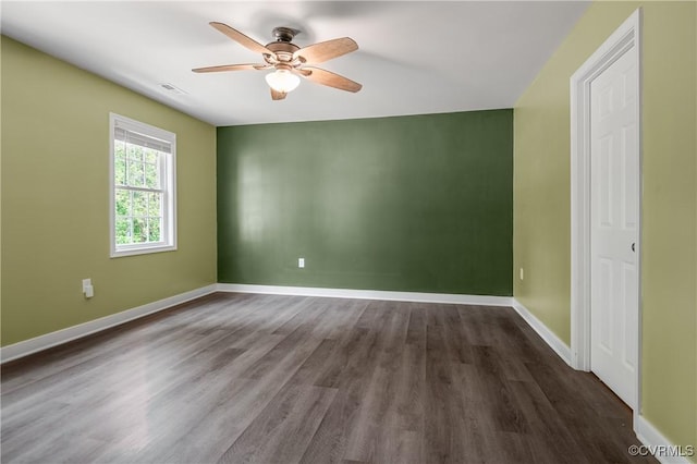 15631 Corte Castle Ter, Chesterfield, VA 23838 - spare room featuring dark wood-style flooring, ceiling fan, and baseboards
