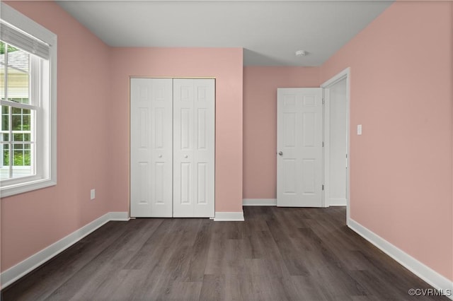 15631 Corte Castle Ter, Chesterfield, VA 23838 - unfurnished bedroom with dark wood-style floors, baseboards, and a closet