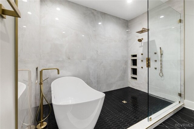 3313 Copeland Way, Powhatan, VA 23139 - bathroom with a shower with shower door, a freestanding tub, marble finish floors, and tile walls