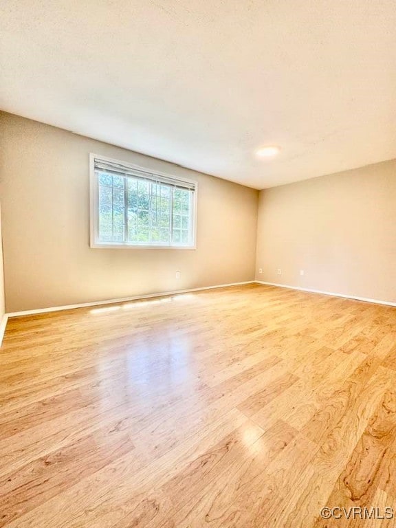 7534 Hollyleaf Ct, Chesterfield, VA 23234 - unfurnished room with light wood-style flooring and baseboards