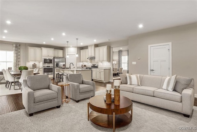8613 Mckibben Dr, Chesterfield, VA 23838 - living area with recessed lighting and light wood finished floors
