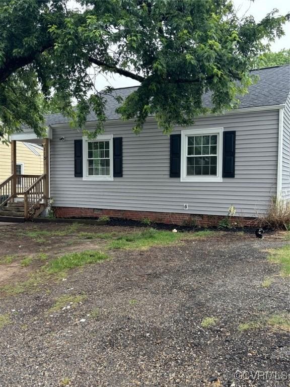113 N Fern Ave, Highland Springs, VA 23075 - view of property exterior with roof with shingles and crawl space