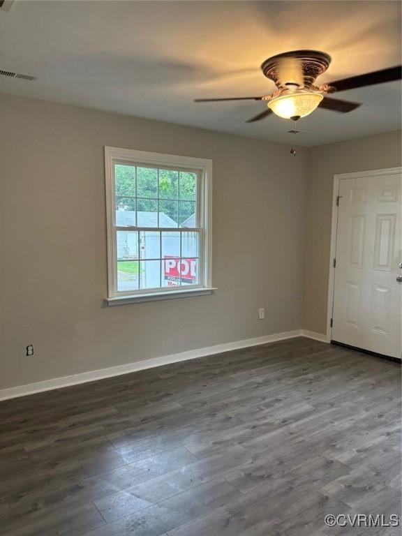 113 N Fern Ave, Highland Springs, VA 23075 - unfurnished room featuring dark wood-style flooring, baseboards, and ceiling fan