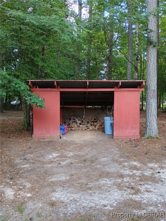 9361 Sheldon Ln, Gloucester, VA 23061 - view of pole building with dirt driveway