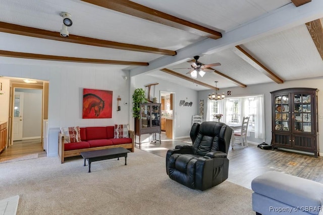 9361 Sheldon Ln, Gloucester, VA 23061 - living room featuring wood finished floors, ceiling fan, a chandelier, and baseboards