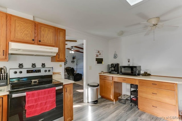 9361 Sheldon Ln, Gloucester, VA 23061 - kitchen featuring stainless steel range with electric stovetop, under cabinet range hood, ceiling fan, light wood-type flooring, and black microwave