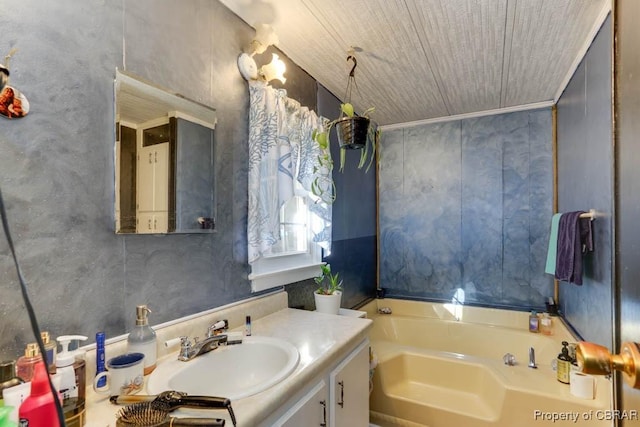 9361 Sheldon Ln, Gloucester, VA 23061 - bathroom featuring vanity, a bath, and wood ceiling