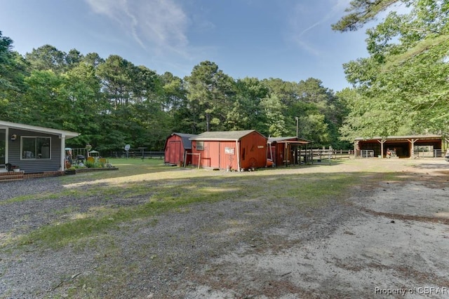 9361 Sheldon Ln, Gloucester, VA 23061 - view of yard with an exterior structure