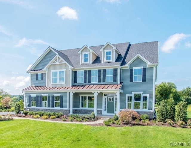 13006 Abercrombie Dr, Chesterfield, VA 23838 - view of front of house featuring a standing seam roof, a front lawn, roof with shingles, a porch, and stone siding