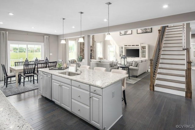 13006 Abercrombie Dr, Chesterfield, VA 23838 - kitchen featuring a sink, stainless steel dishwasher, recessed lighting, an island with sink, and dark wood-type flooring