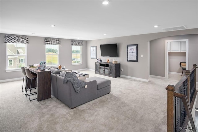 13006 Abercrombie Dr, Chesterfield, VA 23838 - living room with light carpet, baseboards, recessed lighting, and arched walkways