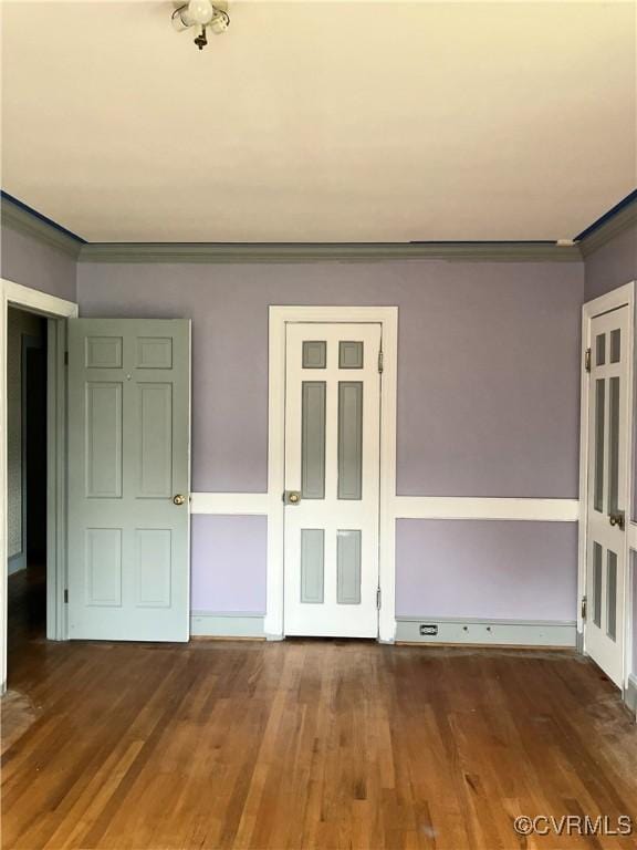726 S Broad St, Kenbridge, VA 23944 - unfurnished room with crown molding and wood finished floors