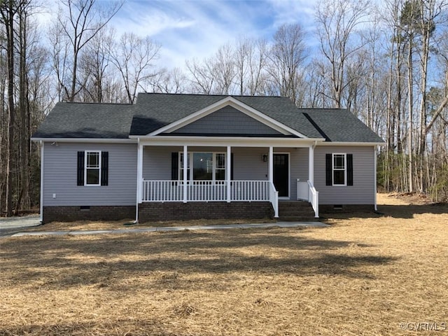 1 Johnville Rd, Dunnsville, VA 22454 - view of front of house with crawl space, a porch, a shingled roof, and a front yard