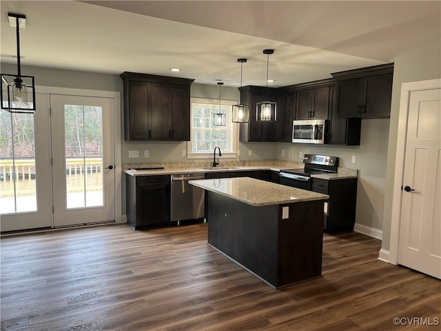 1 Johnville Rd, Dunnsville, VA 22454 - kitchen featuring stainless steel appliances, dark wood finished floors, baseboards, a kitchen island, and recessed lighting